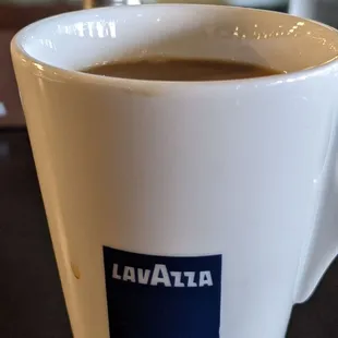 a cup of coffee on a table