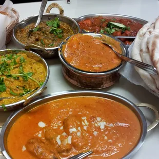 The new location uses real plates, bowls, and utensils - no more disposables like at old place.  Family Style Eating - YUM.