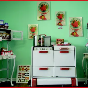 That adorable Eureka stove surrounded by great wall art and local coffee.