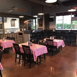 tables with red and white checkered tablecloths