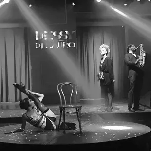 a man on stage with a saxophone