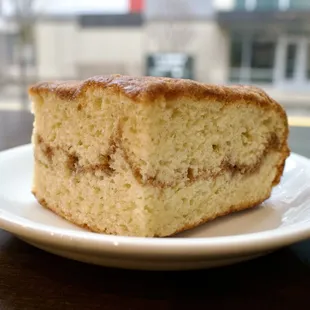 Cinnamon coffee cake. Wrapped in cellophane, it was a touch dry but serviceable and tasty with coffee.