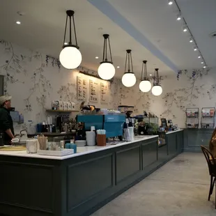 The front counter, extra seating through the door to the left of this image. Nice, bright space.