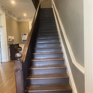 Original front stairs to 2nd floor. Guest entrance stairs have14+4 steps to reach 2nd floor or go down to kitchen &amp; common areas &amp; exit.