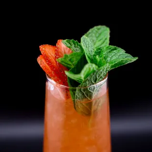 ECLAT Embodies its name, radiance. A dazzling creation with the crisp clarity of vodka and the lusciousness of strawberry-infused Aperol.