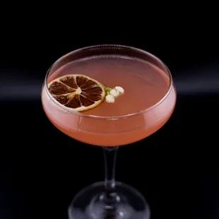 a cocktail in a coupe glass