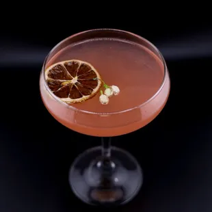 a cocktail in a coupe glass