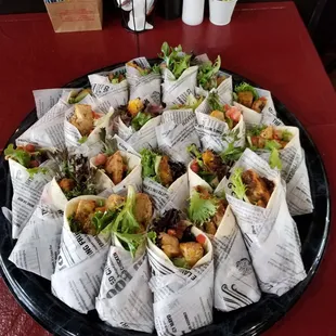 a tray of wraps