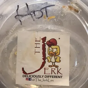 a sticker on a plastic container