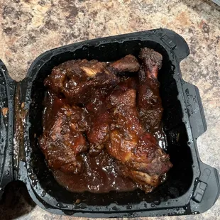 Jerk chicken? Slathered in tangy sauce! Canned Jamaican Calaloo as opposed to homemade fresh veg-