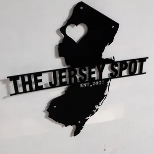 This is their logo.  Cool metal cutout just below the order counter.