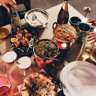 Tandoori chicken, lamb rogan josh and chicken tikka masala with flying horse beer and garlic basil naan!