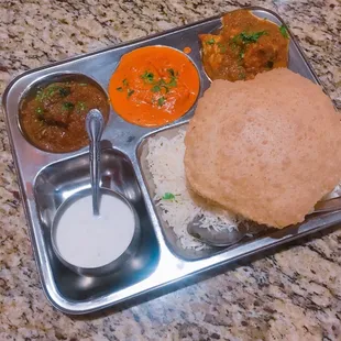 Non vegetarian Thali with chicken curry, lamb curry and chicken tikka masala