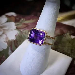 Vintage 18K Gold Ring with a 4.5 Carat Amethyst in a high- profile setting.