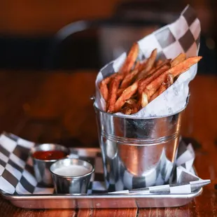 Fresh hand-cut fries, golden and lightly salted, served with your choice of two dipping sauces