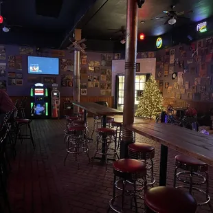 a bar with a christmas tree in the background