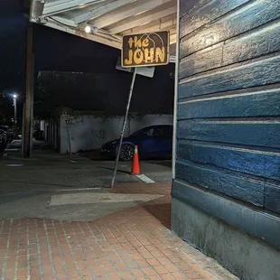 the entrance to the john restaurant