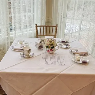 a table set for a tea party
