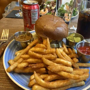 a plate of french fries and a burger