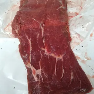Flat iron steak out of packaging