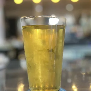 a glass of beer on a table