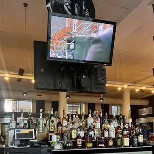 a bar with liquor bottles on the bar