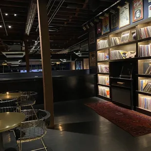 Bar seating upstairs and record library