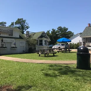 The walk up stand with outdoor picnic tables. There are some Adirondack chairs under the trees nearby as well!