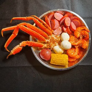 Hungry Feast 1 Cluster Snow Crab Leg 1/2 LB Shrimp ( No head)  1/2 LB Sausage  3 Eggs 1 Corn 1 Potato