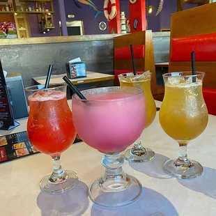 Patronrita, prickly pear daiquiri, 2x henny on the beach