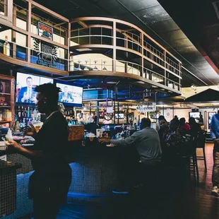 people sitting at the bar