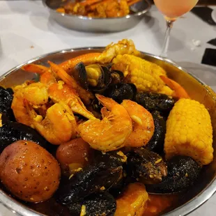 Black mussels, shrimp, and snow crab legs