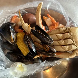 11. Half lb. Dungeness, 1/2 lb. Black Mussels, 1/2 lb. Shrimp no Head, 3 Eggs, 1 Corns and 1 Potato