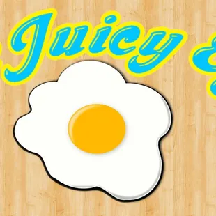 a fried egg on a wooden surface