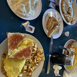 Ham &amp; cheese omelette, biscuits and gravy, waffle, ultimate breakfast platter