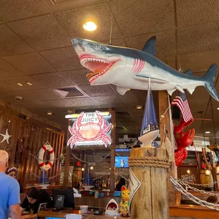 a shark and a boat in a restaurant