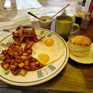 Big T&apos;s Breakfast w extra bacon instead of sausage and side of biscuit with chipotle butter.