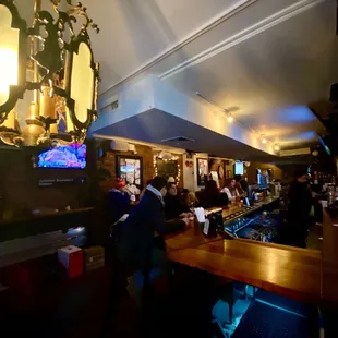 people sitting at a bar