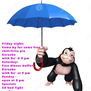 a monkey holding an umbrella