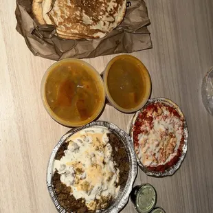 Lamb over rice, Chicken shawarma over rice, Green pea &amp; potato curry, and Tandoori Bread!