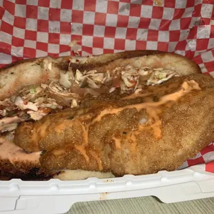 A thick juicy seasoned catfish po'boy.  They also have grilled options