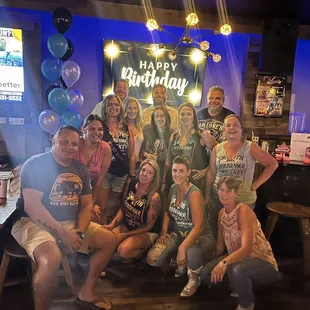 a group of people posing for a picture