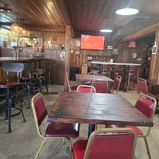 Seating: bar area, booths and tables