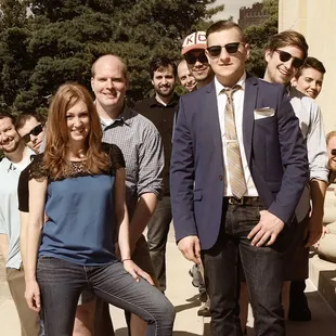 a group of people posing for a picture