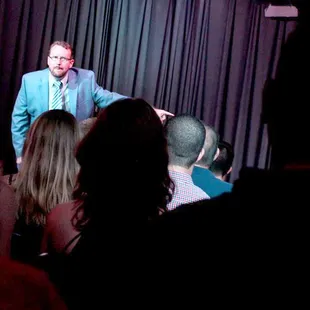 Tim gives the audience a pep talk before the big game.