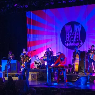 a band performing on stage