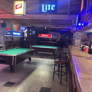 a pool table in a bar