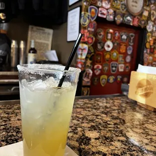 Coconut margarita sitting at the bar