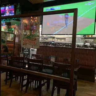 Clear plexiglass partition between tables