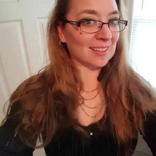 Kimberly E.